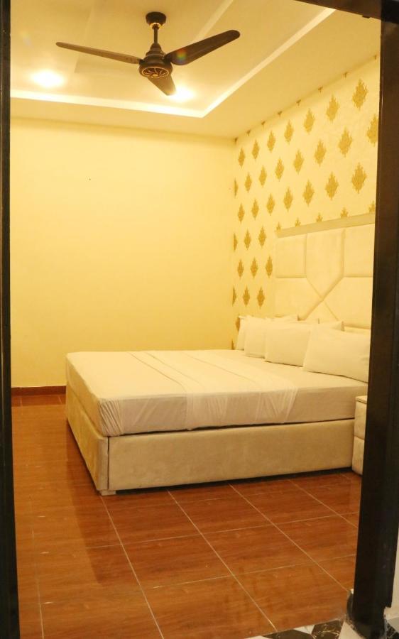 Hotel De Smart Multan Esterno foto